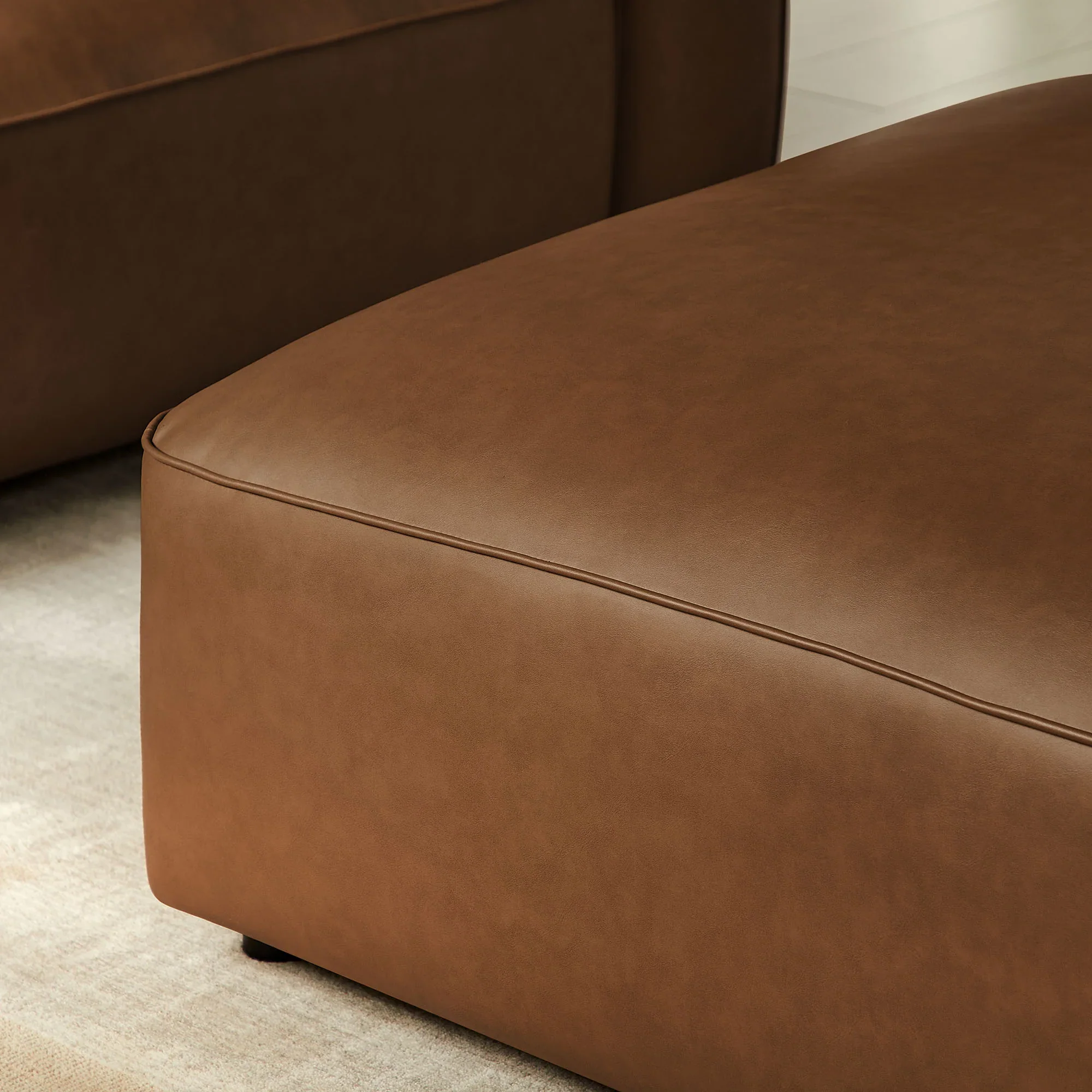 Auren Upholstered Vegan Leather Ottoman - Image 12