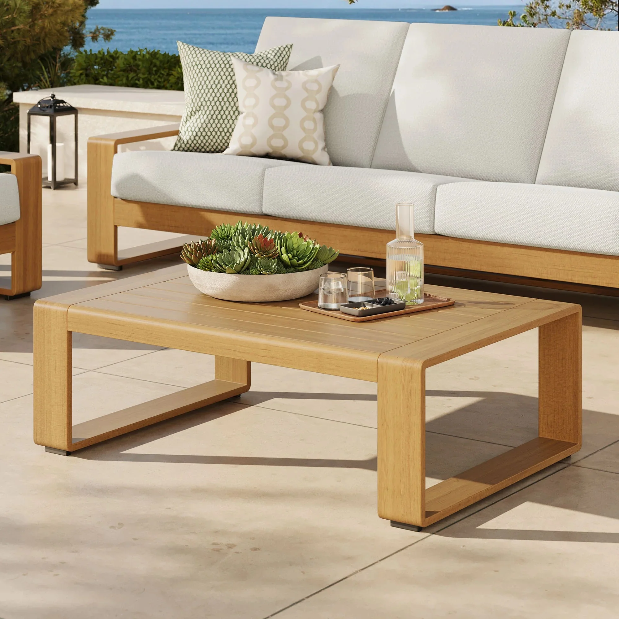 Lirienne Outdoor Patio Aluminum Faux Wood Coffee Table in Natural - Image 2