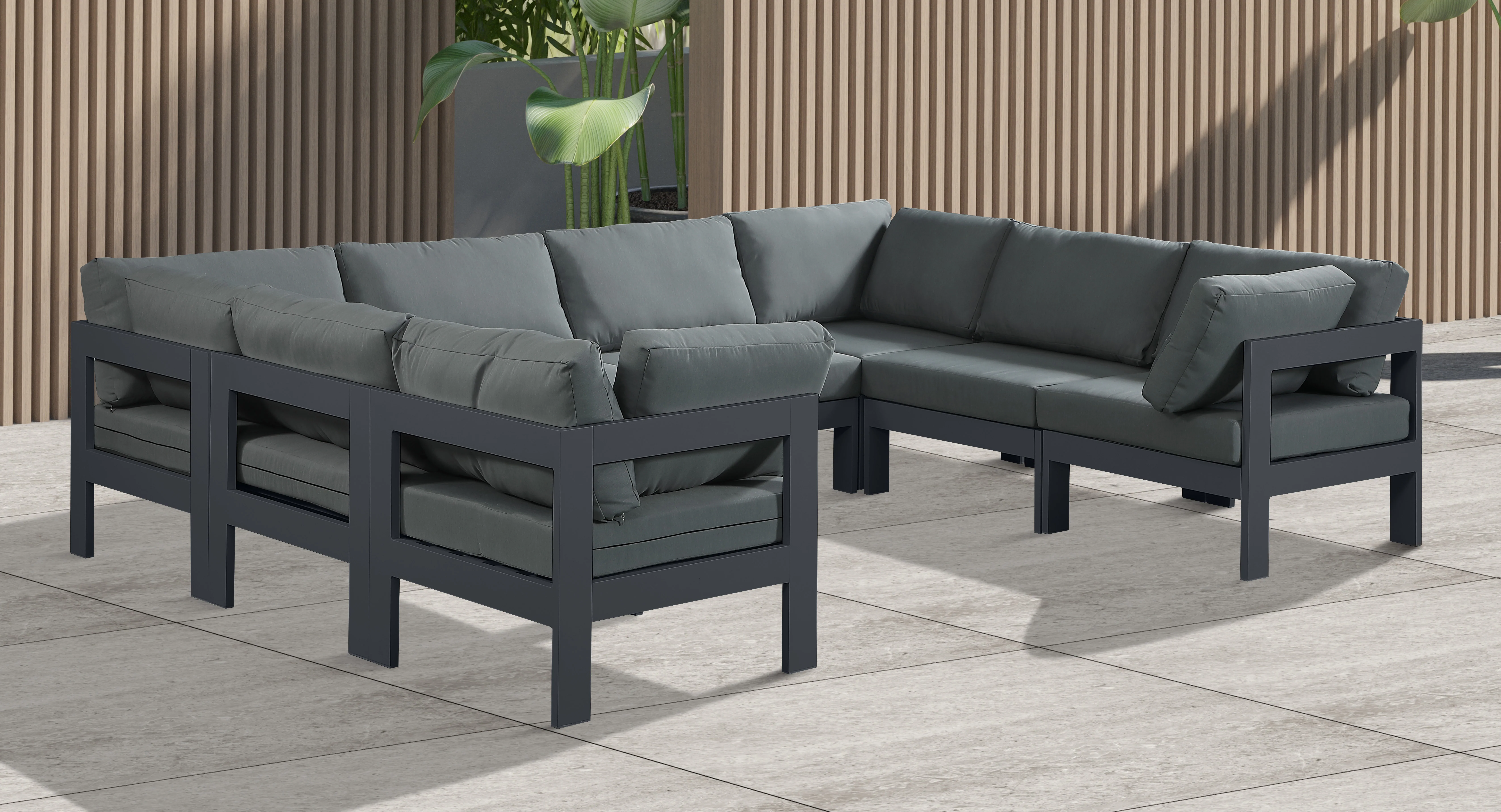Nizuc 120" Water Resistant Fabric Upholstered Outdoor Patio 8pc. Modular Sectional - Image 2