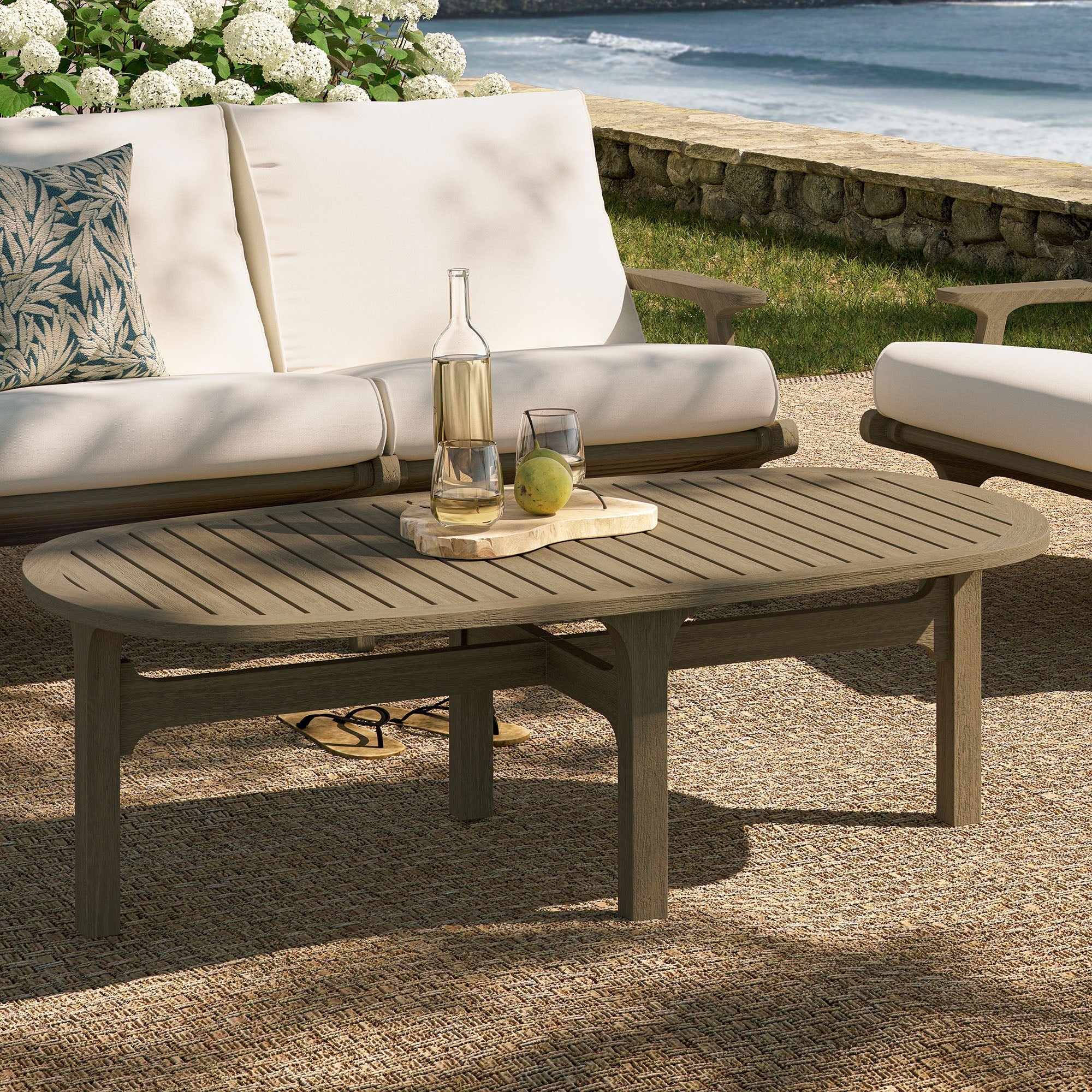 Saratoga Oval Outdoor Patio Teak Wood Coffee Table in Weathered Gray - Image 2