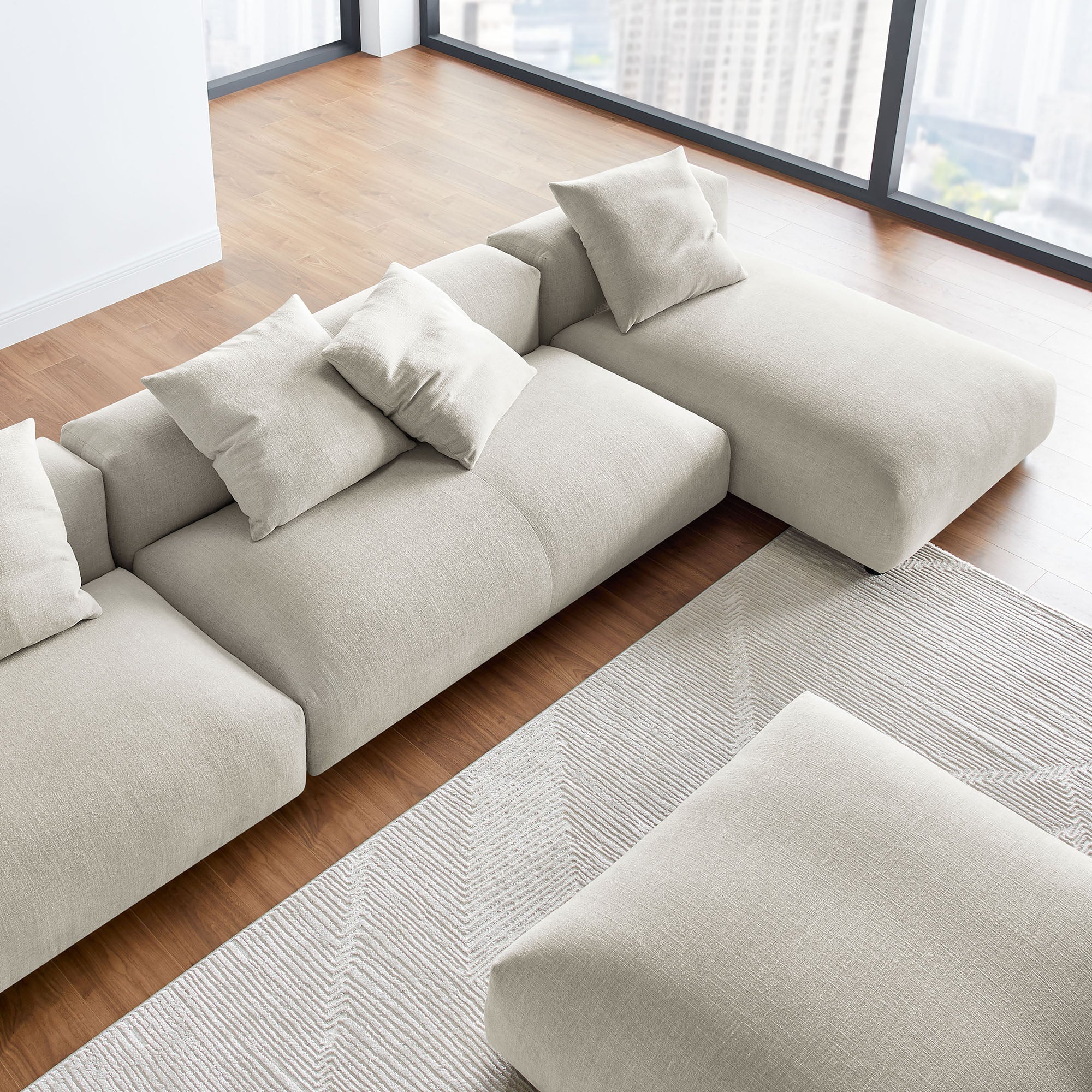 Solace 4-Piece Modular Upholstered Fabric Sectional Sofa With Ottoman - Image 4